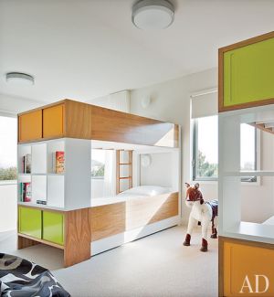 A geometric Hamptons house by Leroy Street Studio and decorator Thad Hayes Design-bunk-room.jpg
